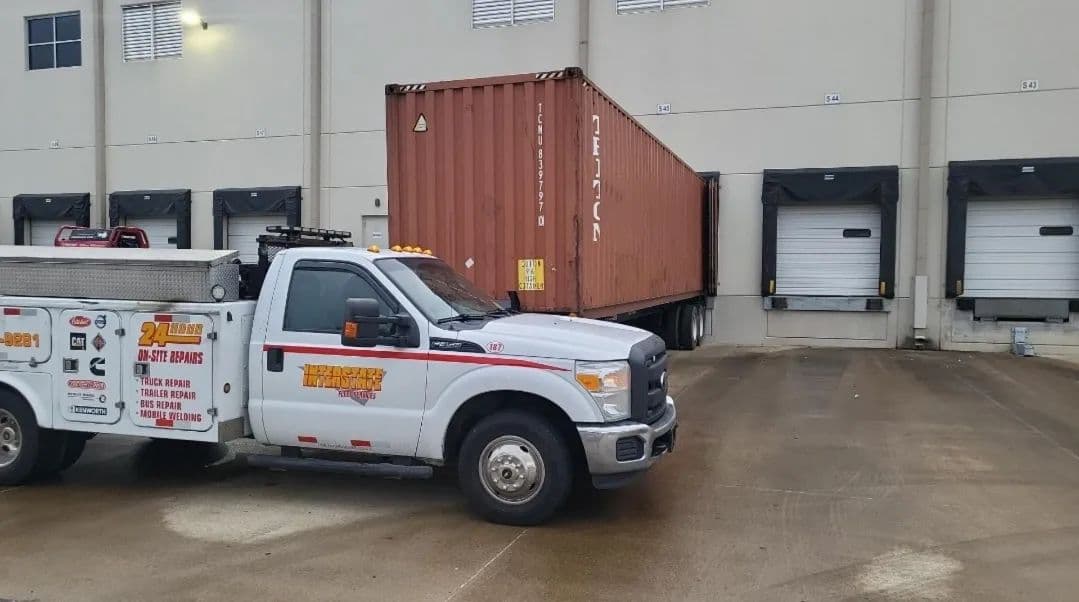 Interstate Fleet Services trucks working a loading dock