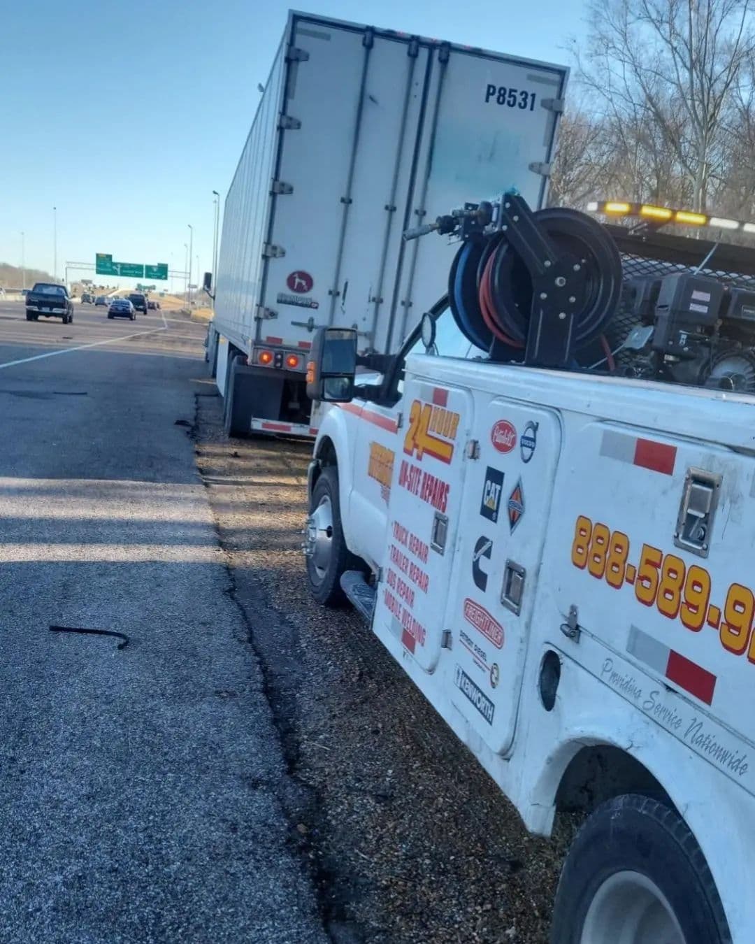 Heavy-duty truck on the highway serviced by Interstate Fleet Services